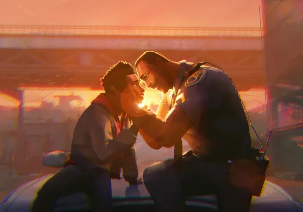 Miles Morales embracing his father Jefferson Davis at sunset in Spider-Man: Beyond the Spider-Verse